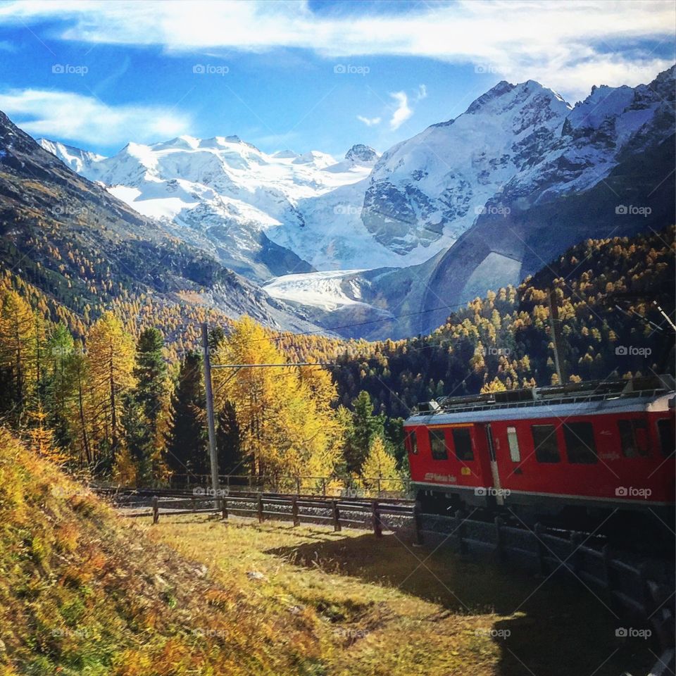 The Bernina Express passing through the enormous and jaw dropping glaciers of the Alps.