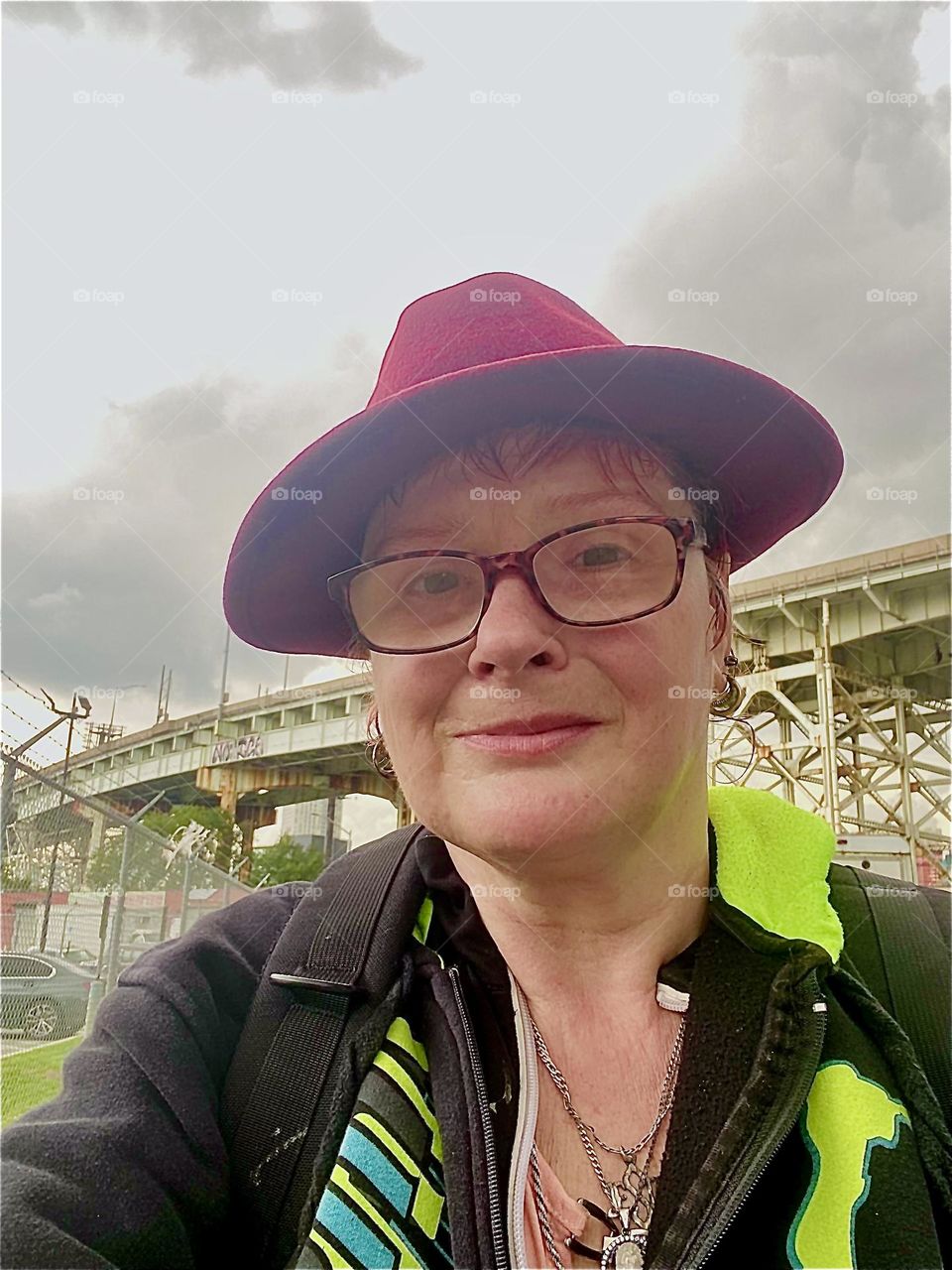 This is me, “Petra Schiller” a.k.a. “Maxine Firefox” a.k.a. “Maximilliane Feuerfuchs” in front of the downward sloping “Brooklyn Queens Expressway”, the “BQE” running parallel to “Borden Ave” and the “Borden Avenue Bridge”. 2023. Hypnotic Productions