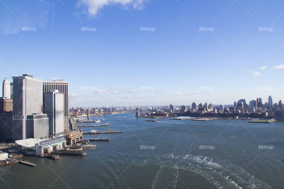 Aerial view of Brooklyn bridge over the river
