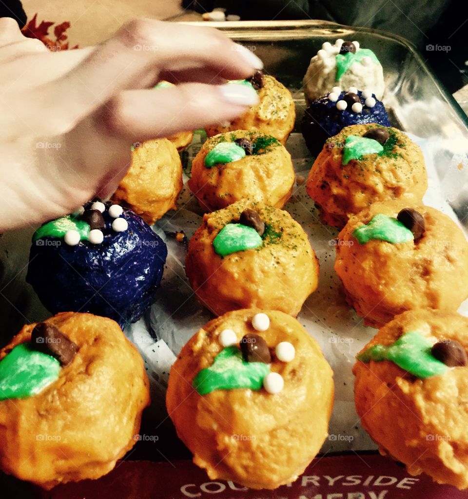 Making mini pumpkin bundt cakes 