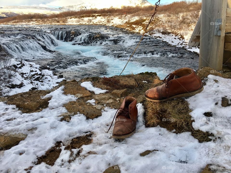 Shoes abandoned by the river. 