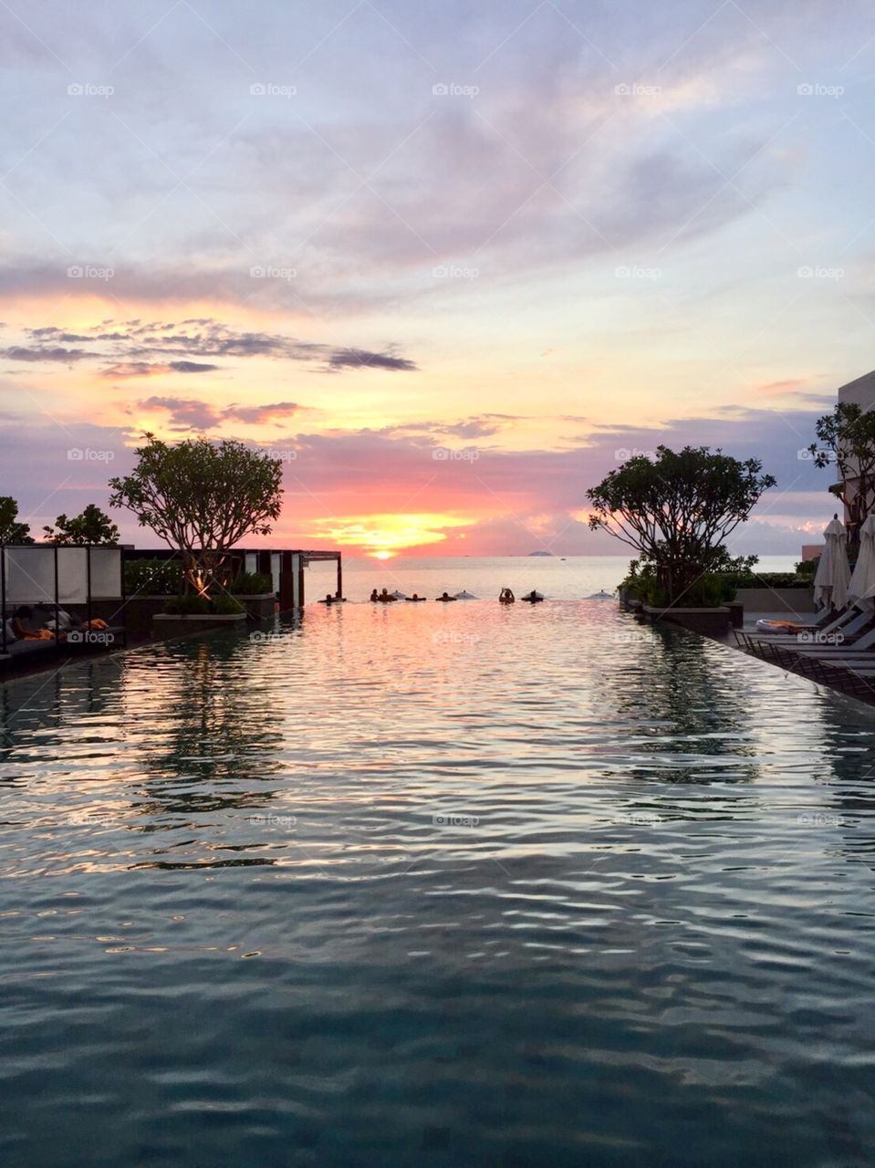 Looking sunset from swimming pool 