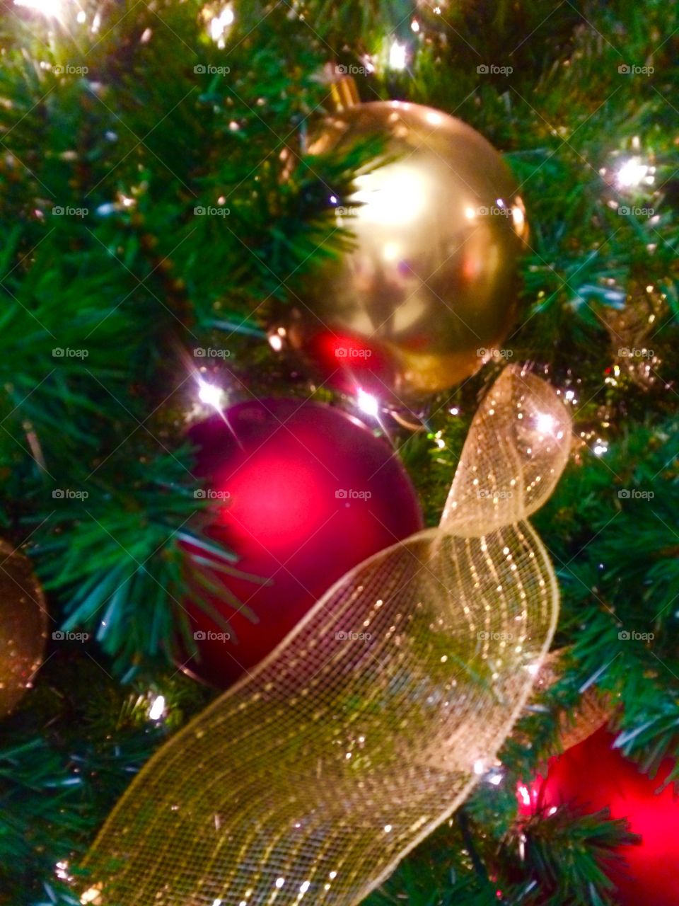 Red and gold Christmas tree decorations. 