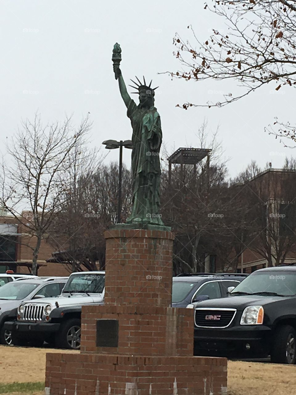 Statue of Liberty at a hospital in our area while visiting a friend. The statue is outside in the parking lot on the visitors side.