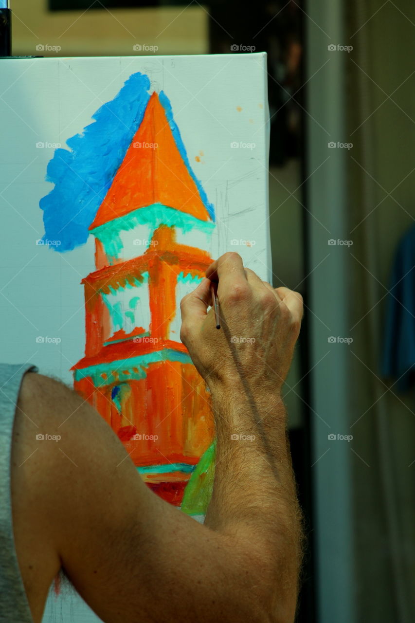 painting church. man painting With brisa and oil