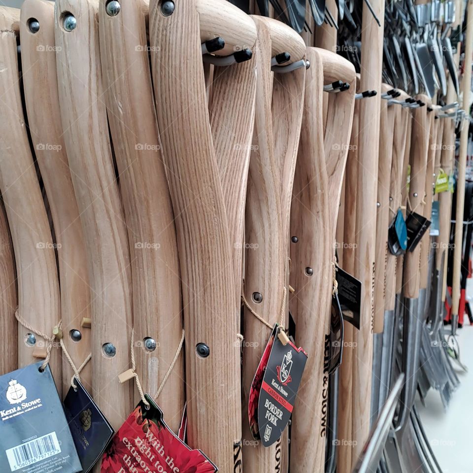 gardening tools. wooden handles. shovel. shop