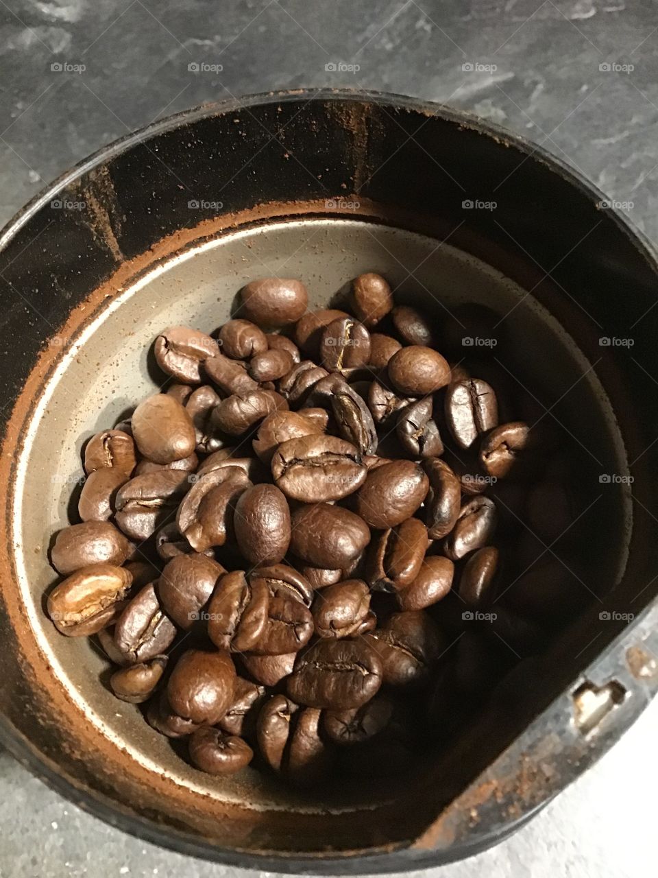 Coffee beans from Costa Rica in the grinder 