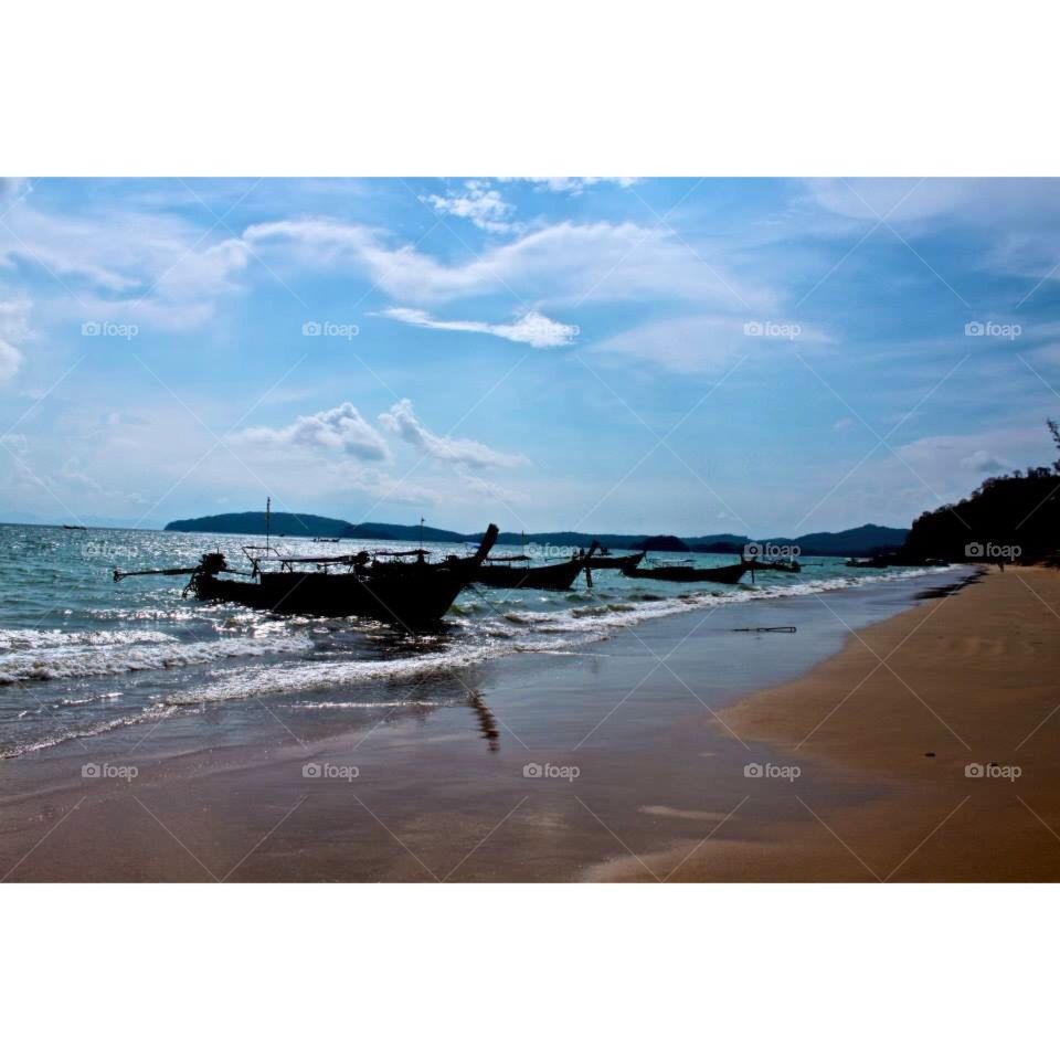 Seaside. Longboats in Thailand
