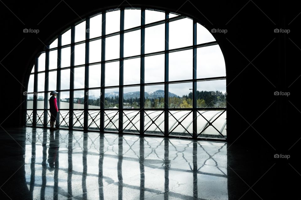 Selfie at the window . Love this big window and it's reflections.