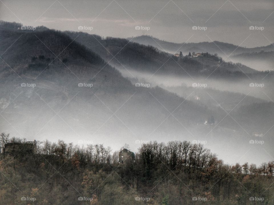 View of mountains in fog