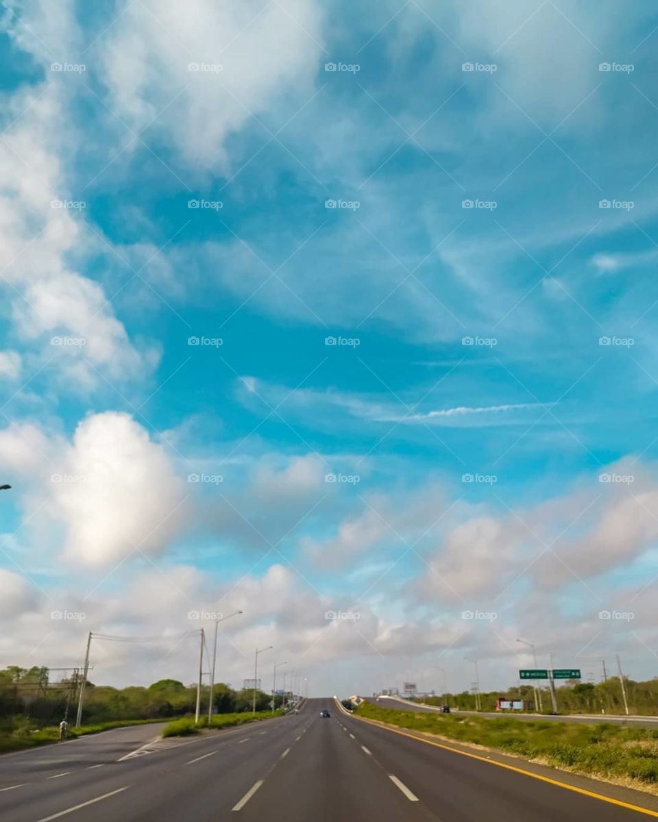 landscape that road with blue sky and white clouds