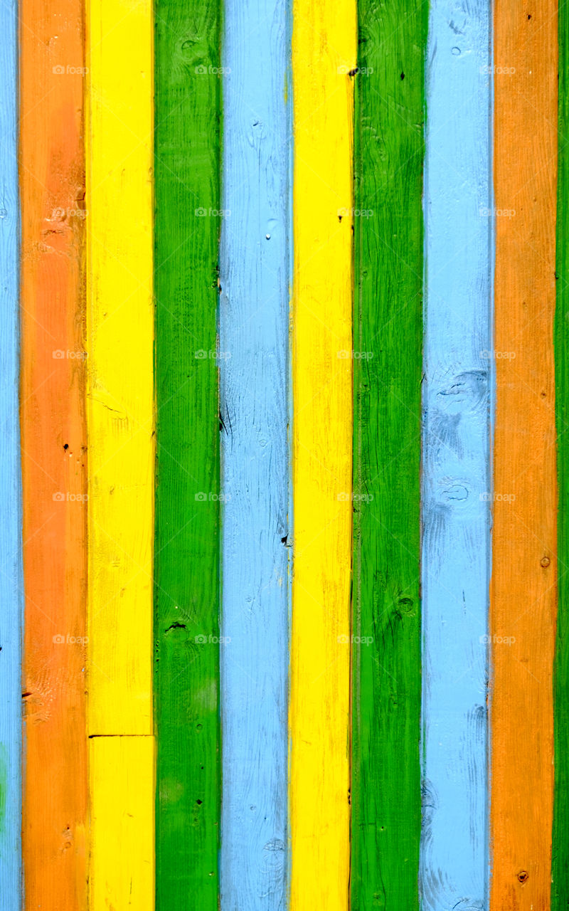 Multicolored background from planks