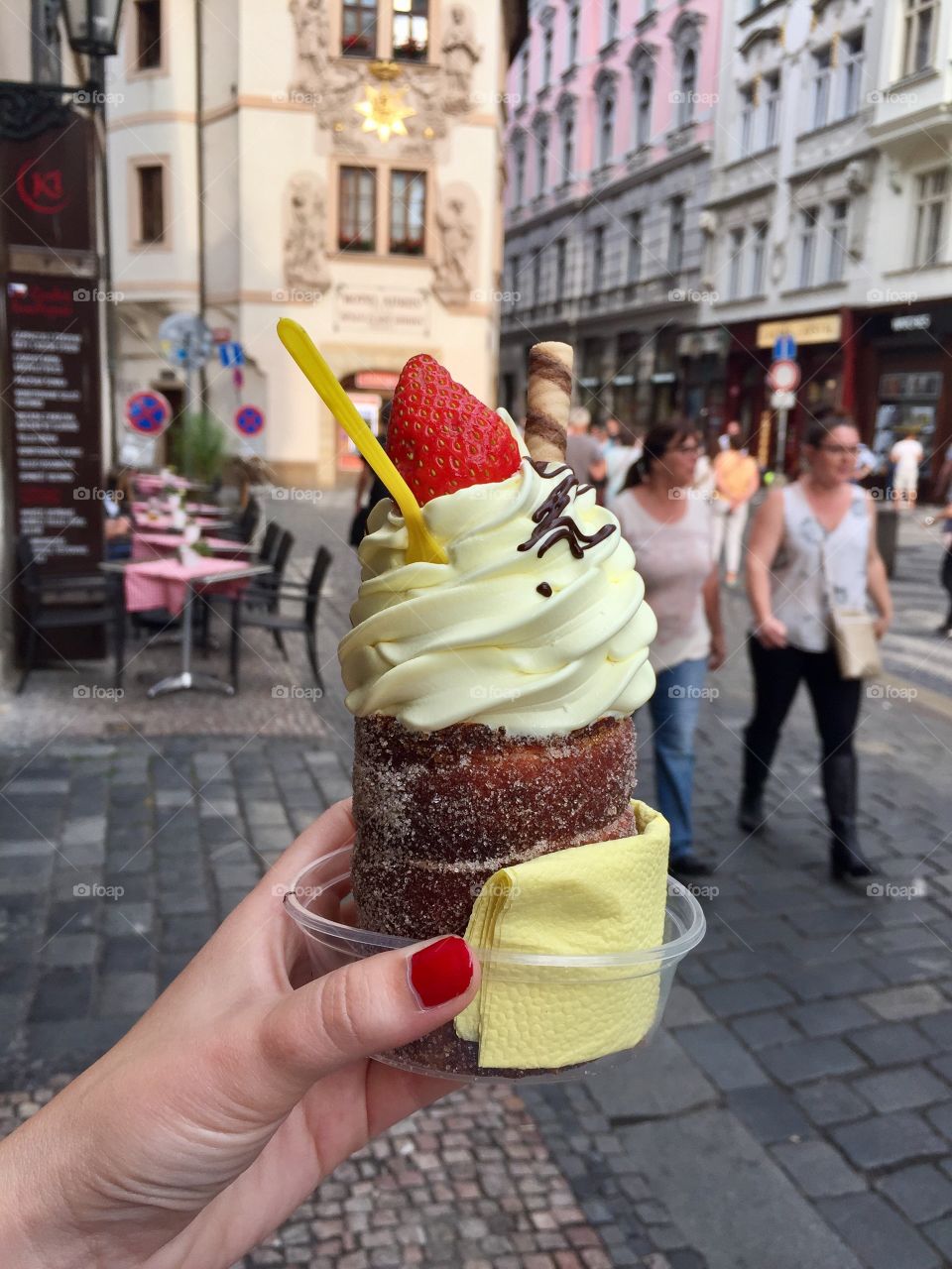 enjoying a treat in the streets of Prague