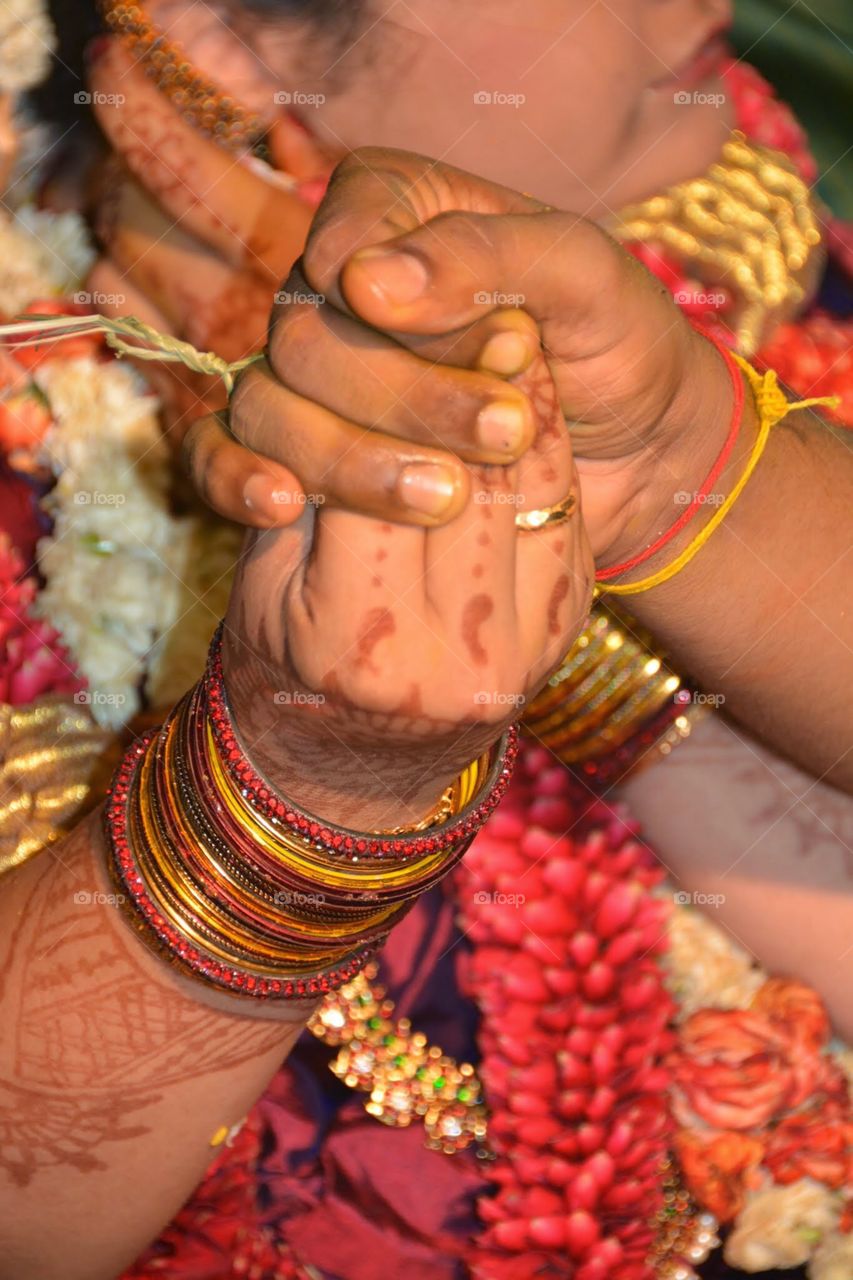 A promise - Indian marriage custom - I hold your hands now and will never leave it. 