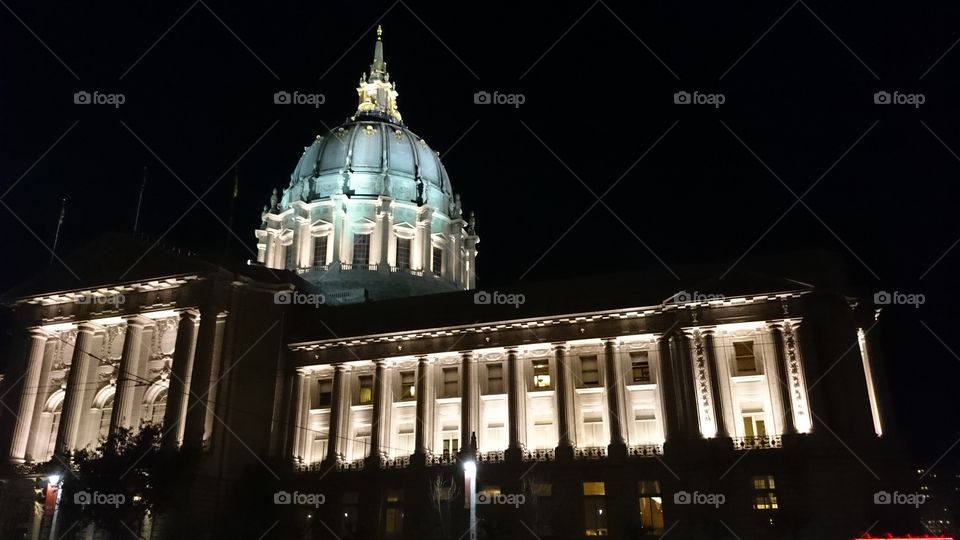 San Francisco City Hall. The impressive civic center of San Francisco, built 1913, is lit each night, highlighting the Beaux-Arts architecture.