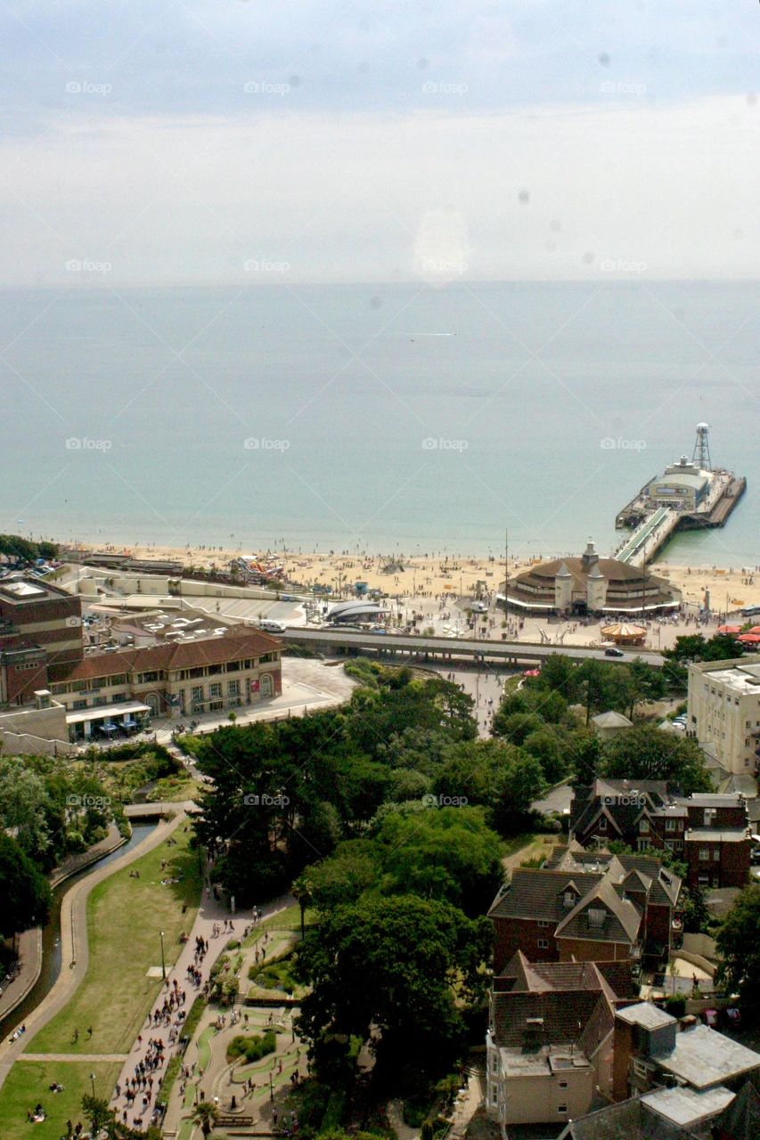 Summer time beach and pier of the city view from above 