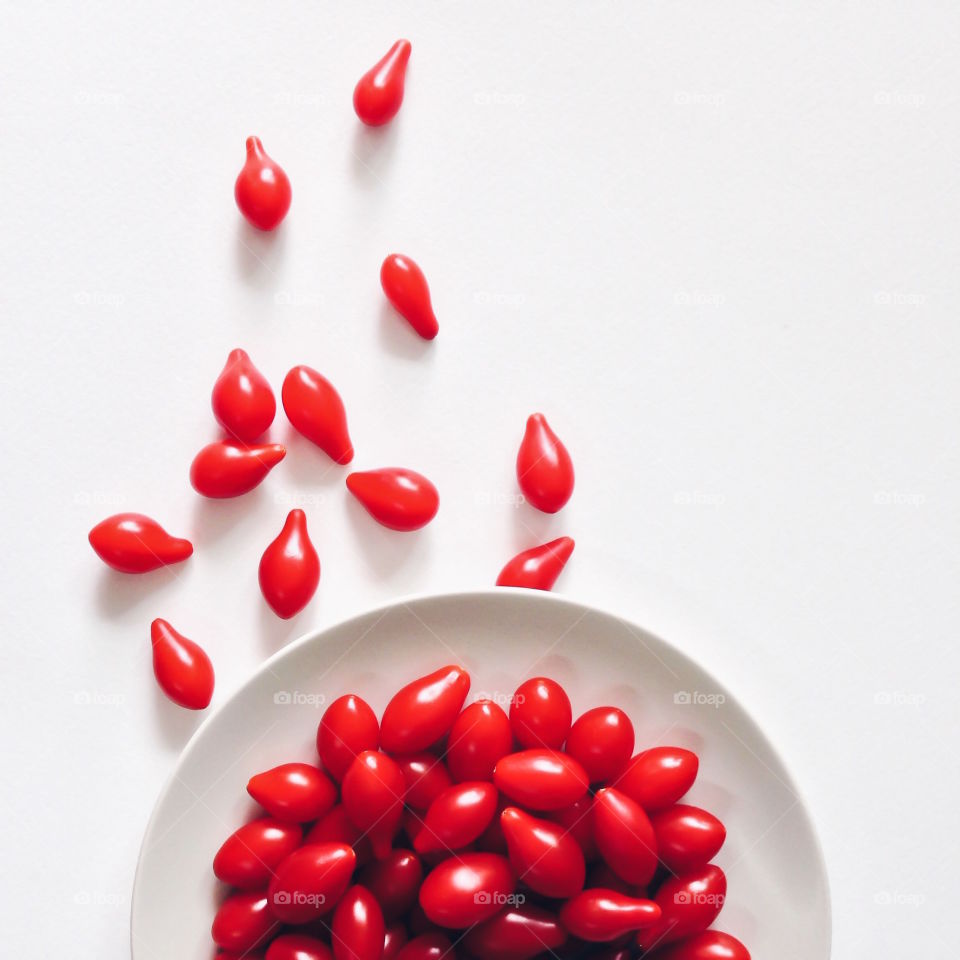 Fresh cherry tomatoes .