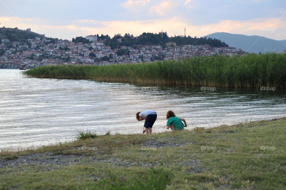 Kids by the lake