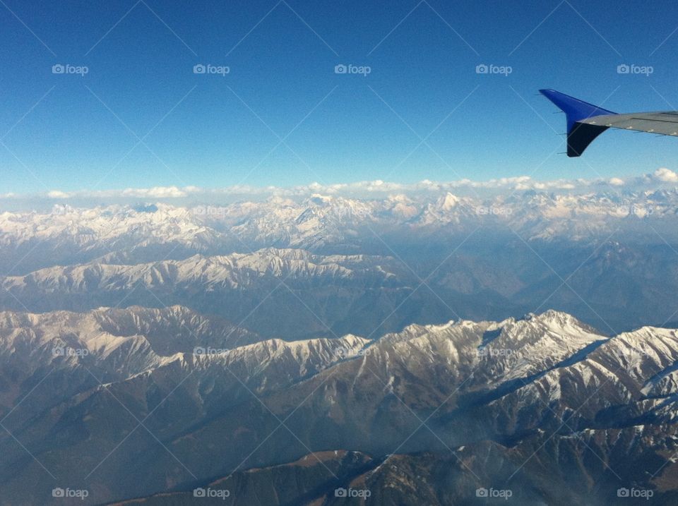 Flying Back - Away from the Snow Capped Himalayas