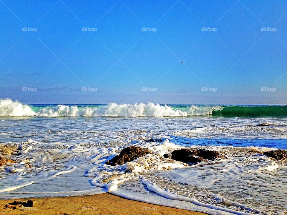 Surf at California coastline