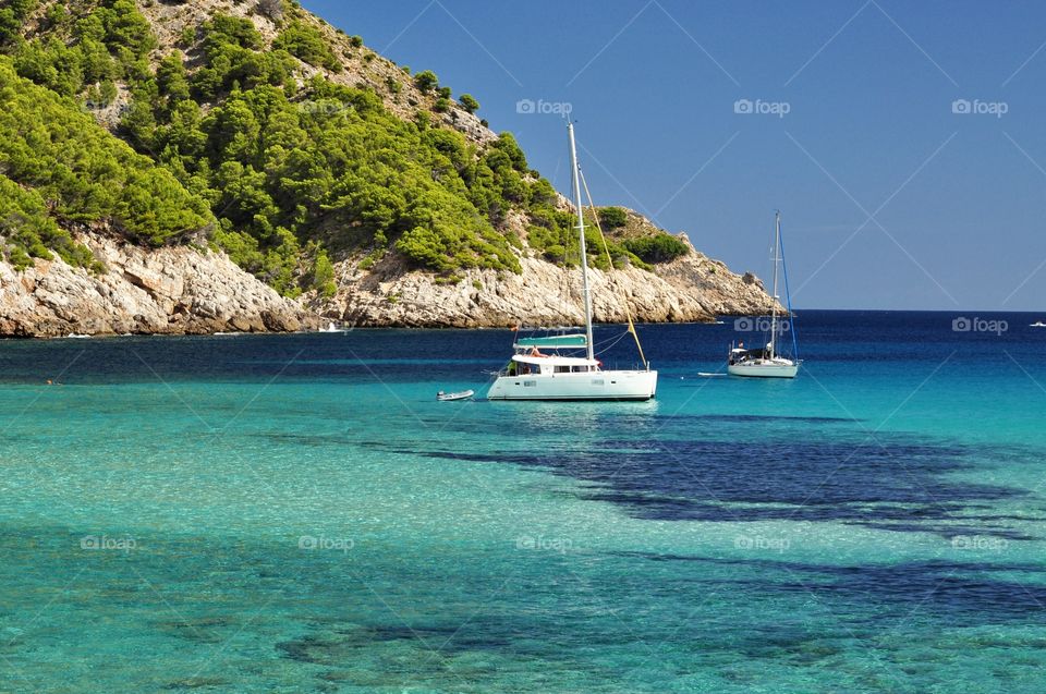 cala molto view with yachts on mallorca balearic island in spain