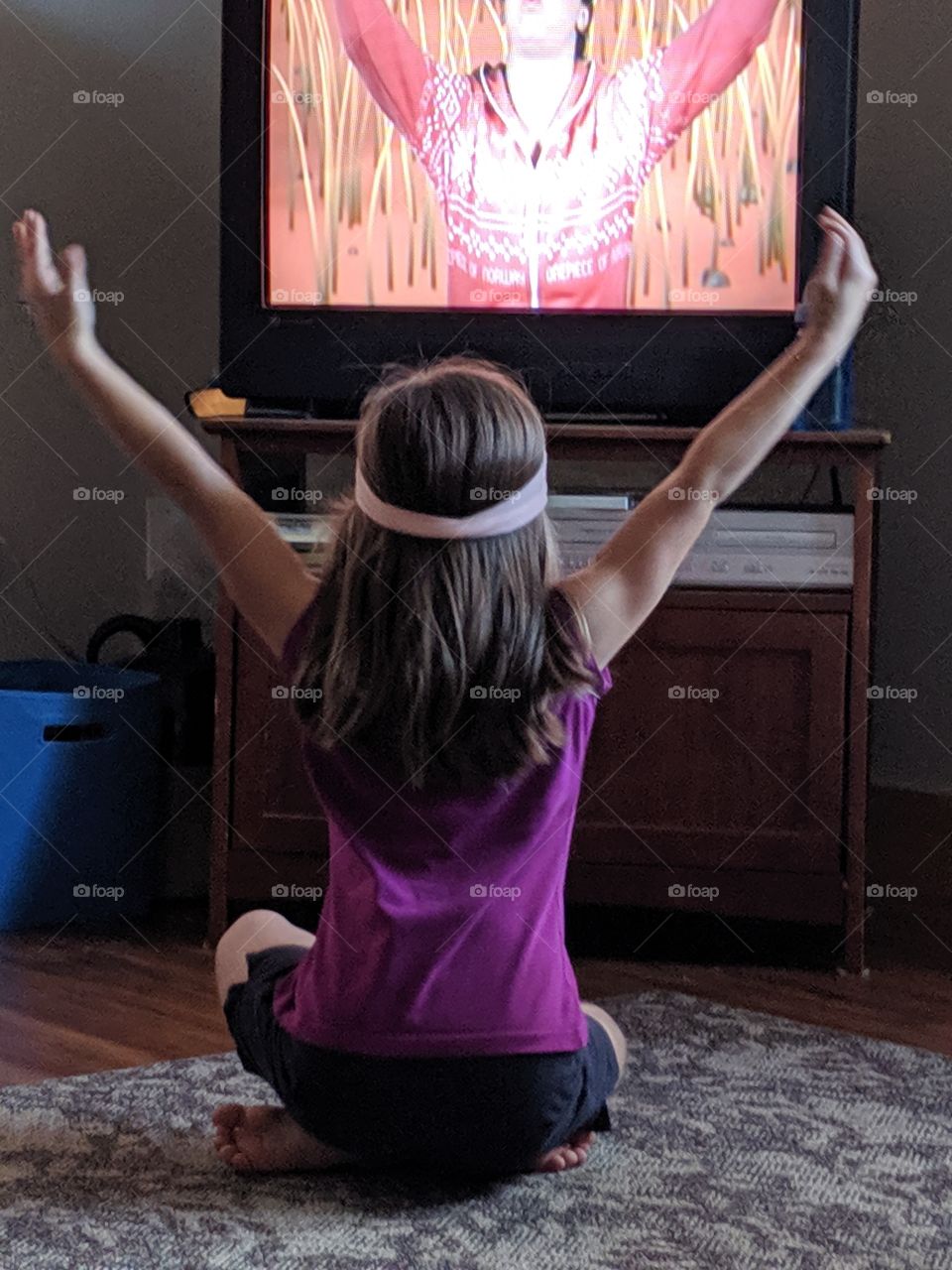 little girl doing yoga