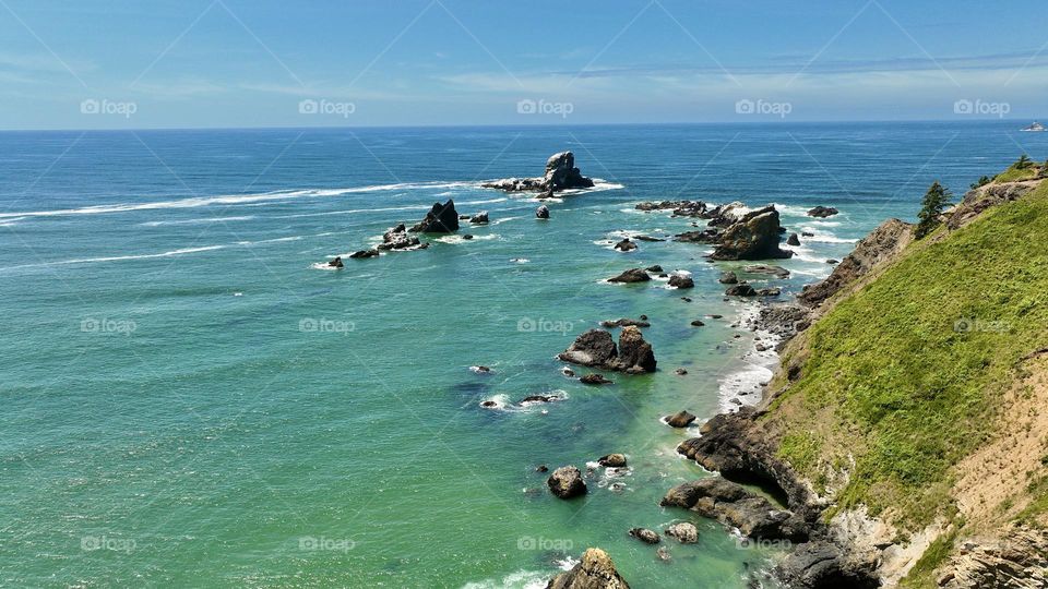The ancient rock formations off the coast of cannon beach Oregon are a natural wonder, they have stood the test of time as they stand tall against the mighty Pacific Ocean 