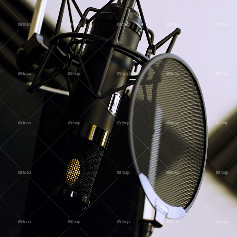 Studio condenser mic by Slate Digital attaches to a pop filter. 