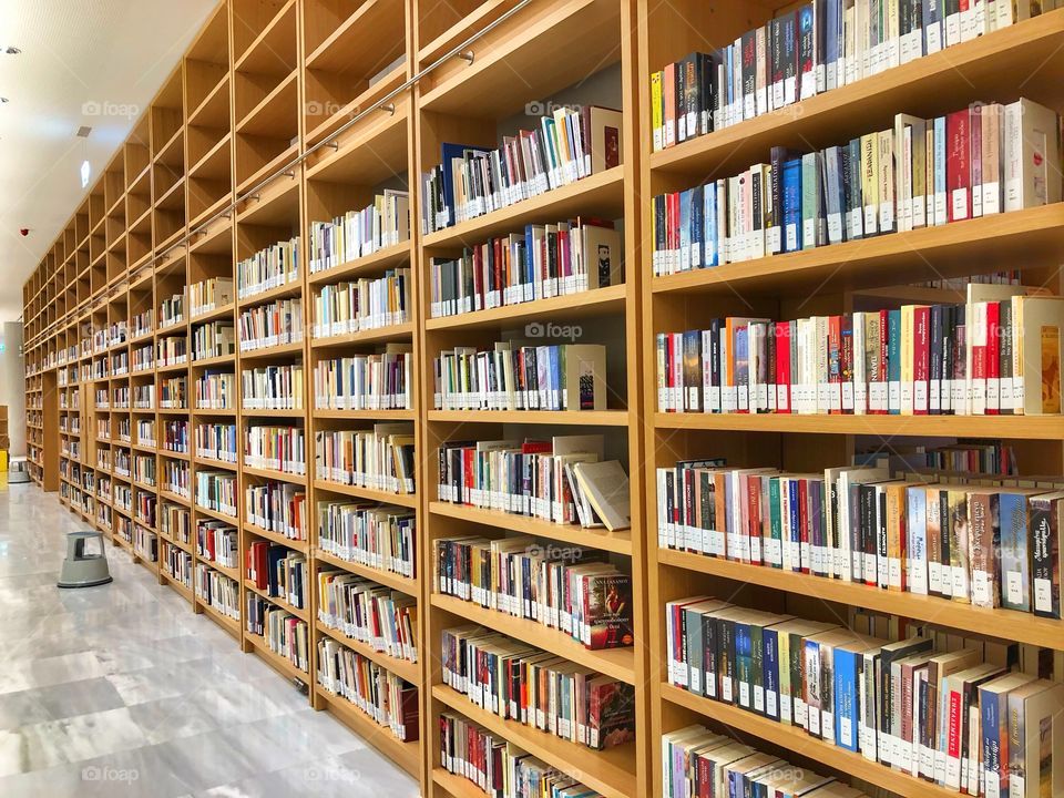 Books on shelves in a library 