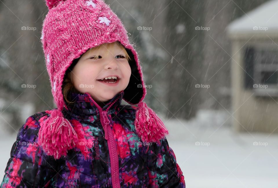 Cute girl laughing during winter