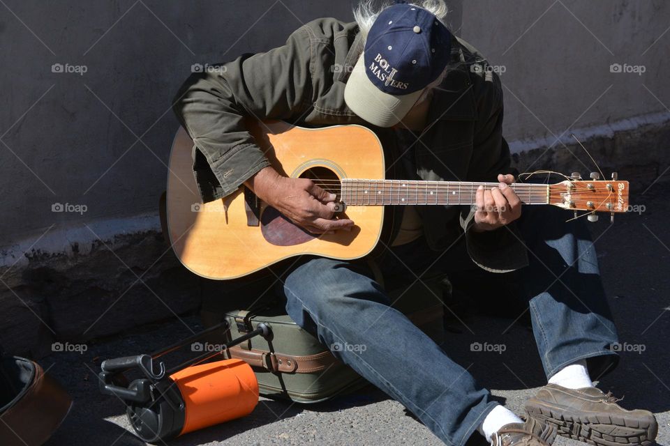 Street musician playing from the heart