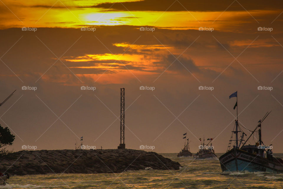 Fishing boat at sunset