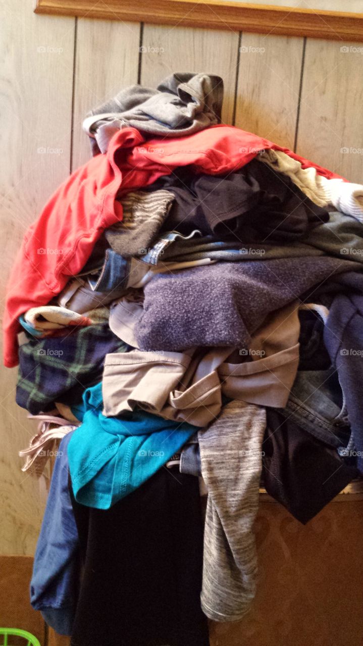 A pile of laundry or clothes, should you like that better.