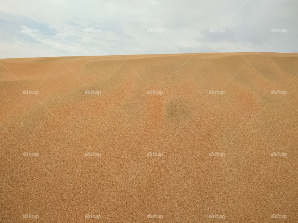 sun of summer time on sky and sand 