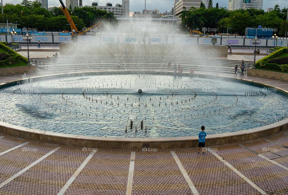 The fountain presenting splashing water view.