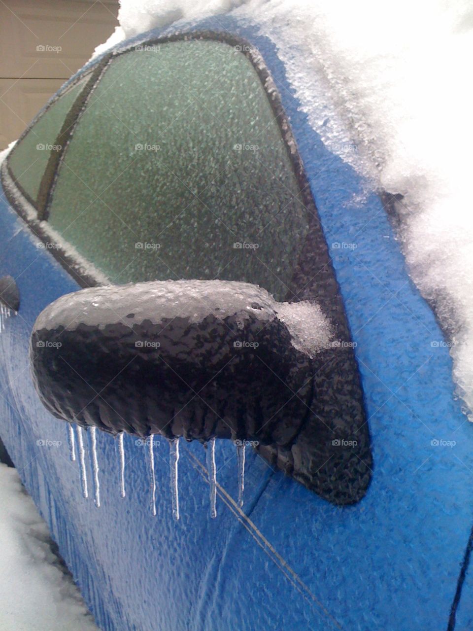 freezing rain encapsulates car