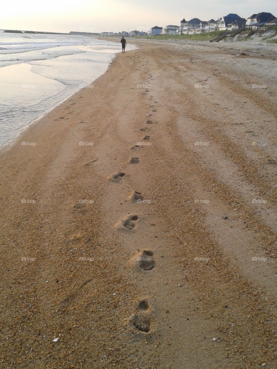 footprints in the sand for the now