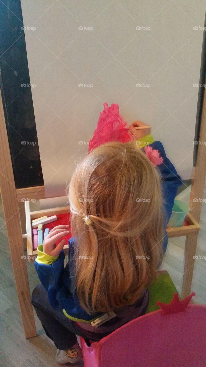 Painting with her favourite colour