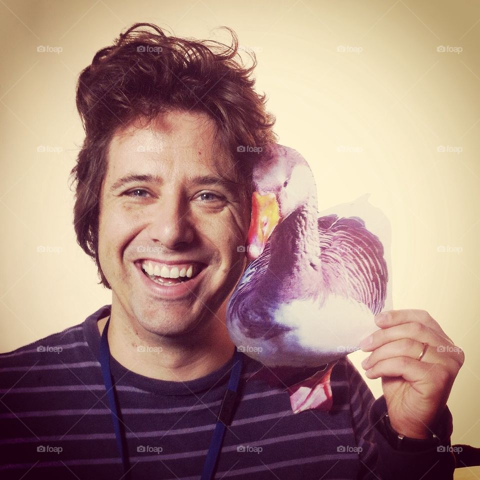 Happy man with a goose