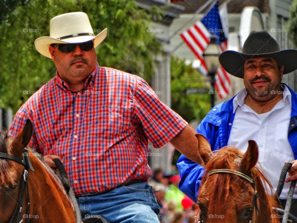 Modern American Cowboys. Latino Cowboys In A Fourth Of July Parade
