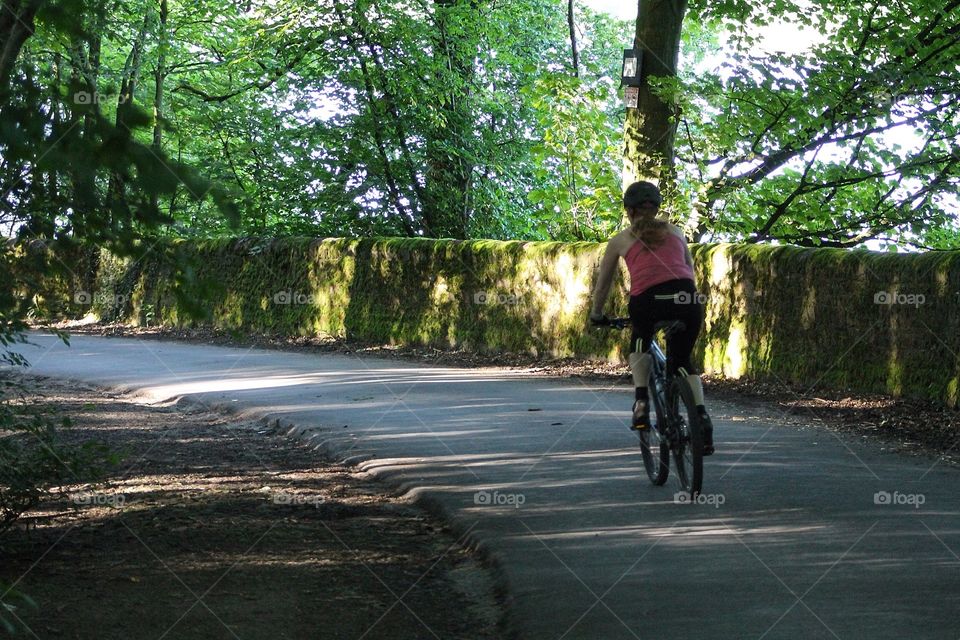 Cycling through the wood. Cycling through the woods