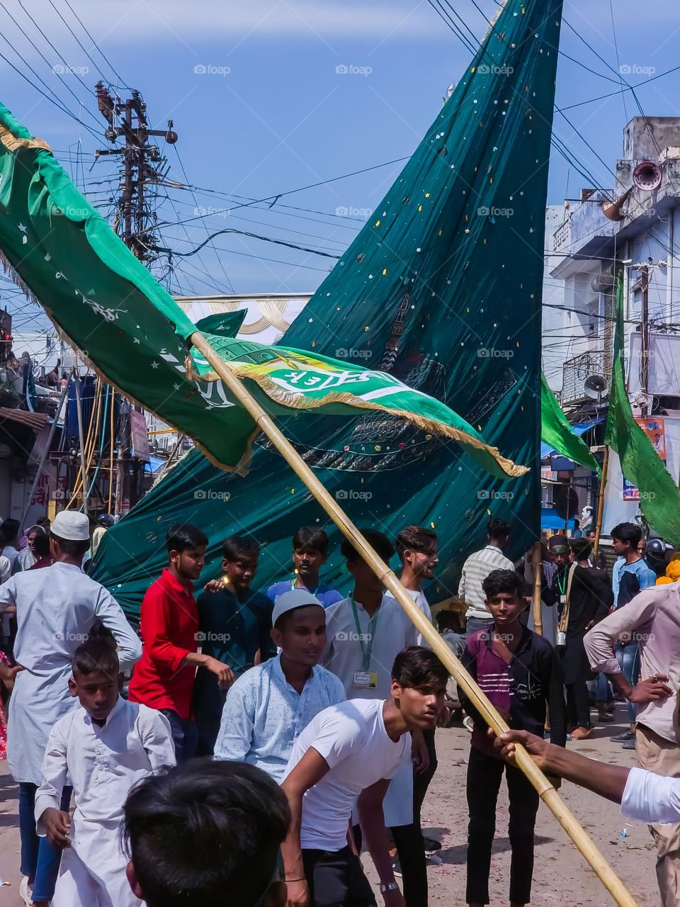 Children playing with flags in a festival