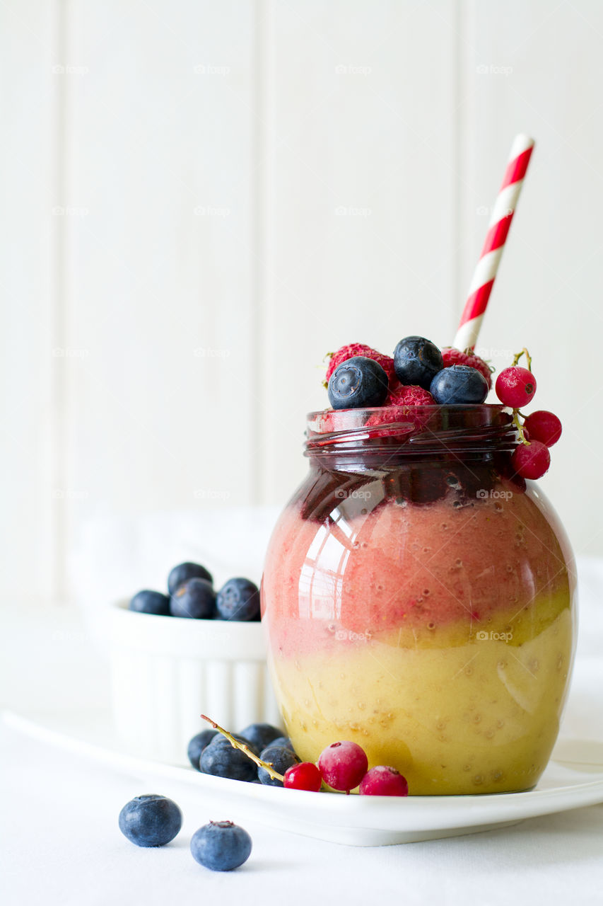 Smoothie with blueberries and raspberries