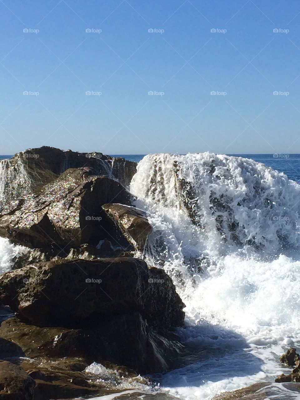 Rise and Shine. Waves crashing the rocks in Laguna Beach, California