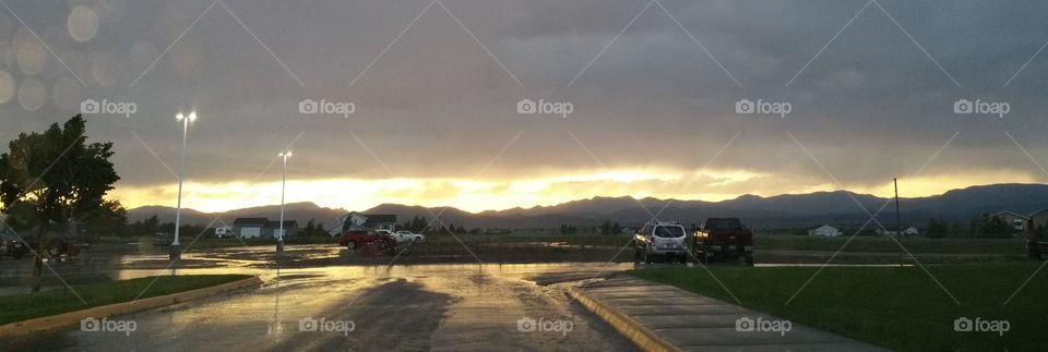 rain storm at sunset