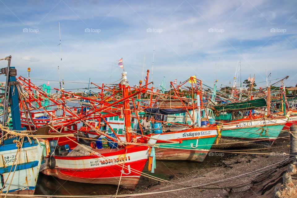 Thai Fisherman's boats at a fishing Pier in Thailand Southeast Asia
