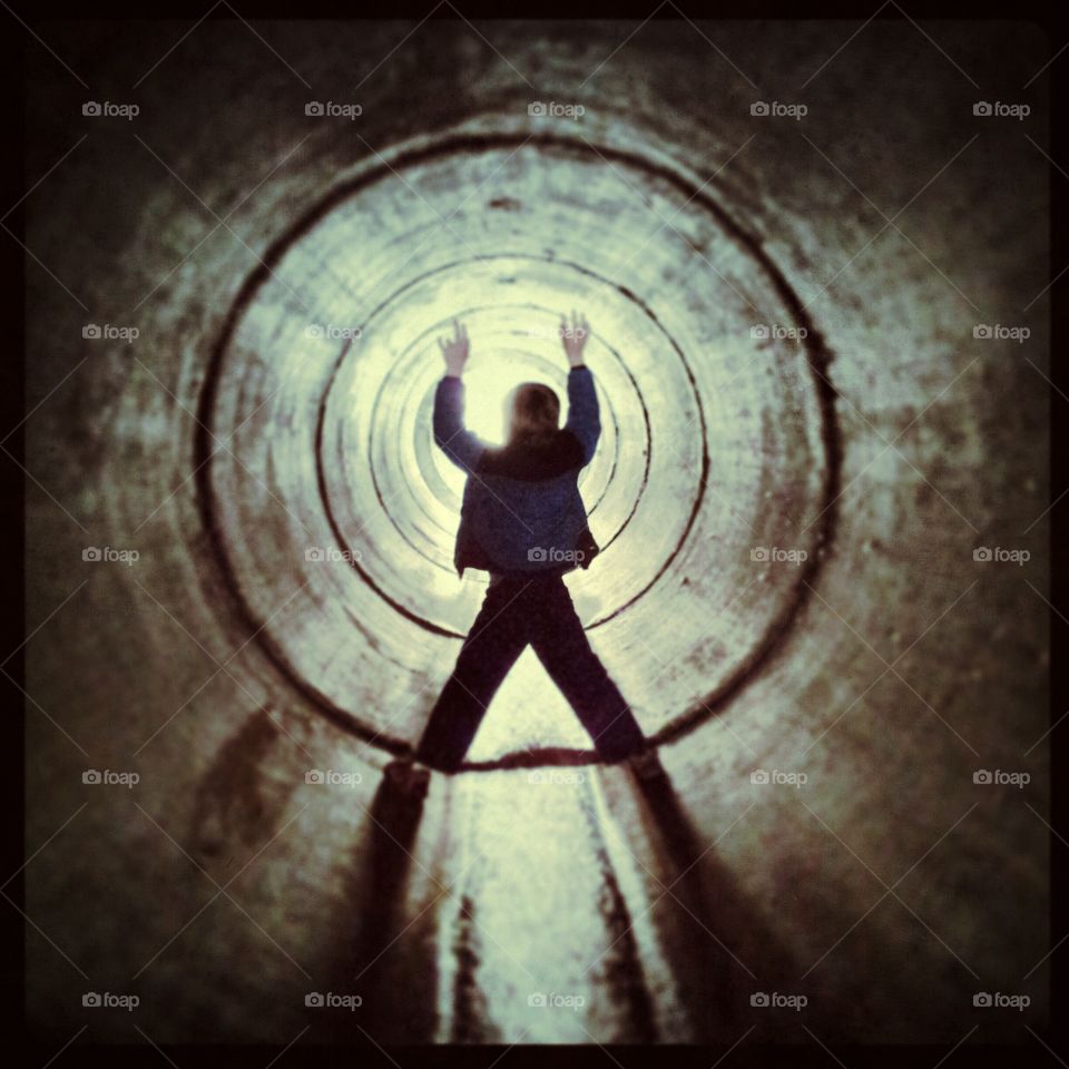 Boy in tunnel