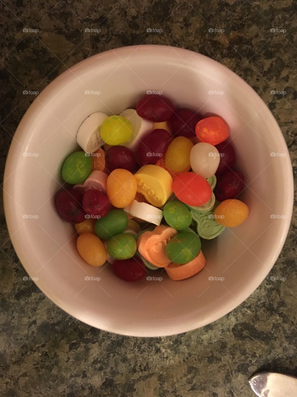 Gourmet jelly beans and hard candy Easter hearts for an evening snack. Colorful 
