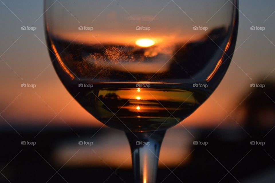 Sunset Captured in a Glass of Wine 