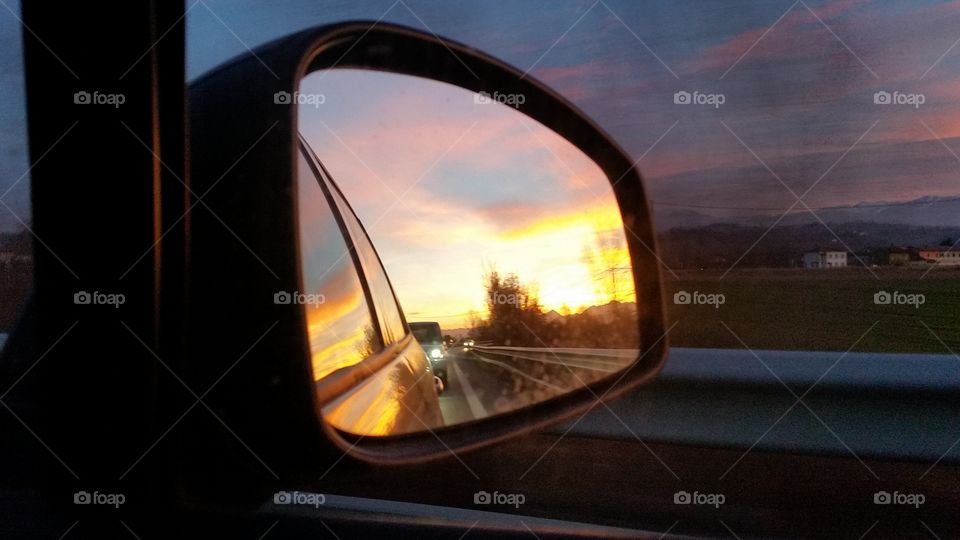 Sunset by car